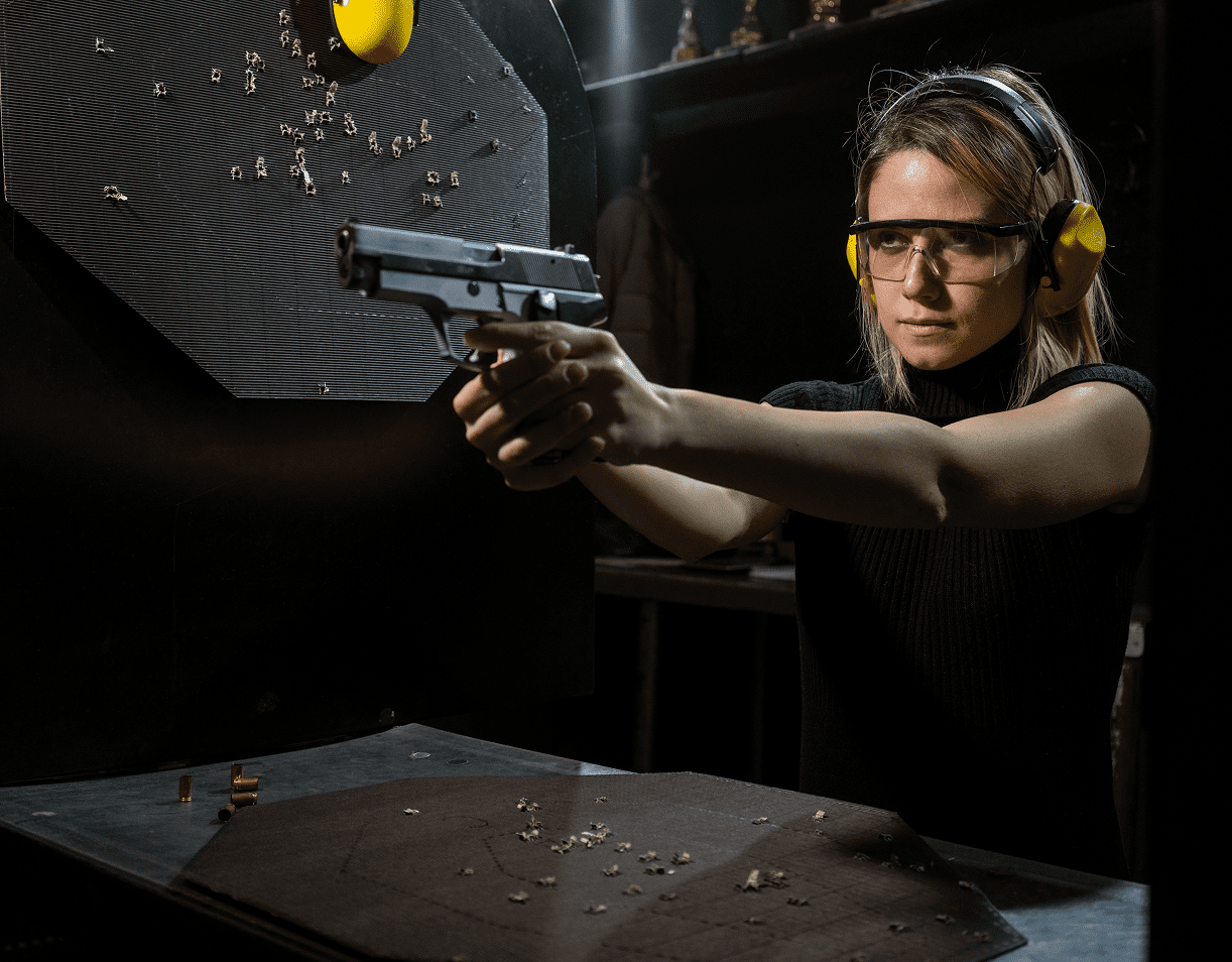 Shooter wearing ear protection and glasses