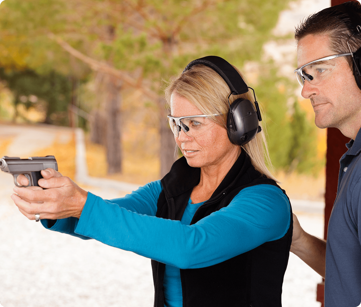Shooting range practice with instructor